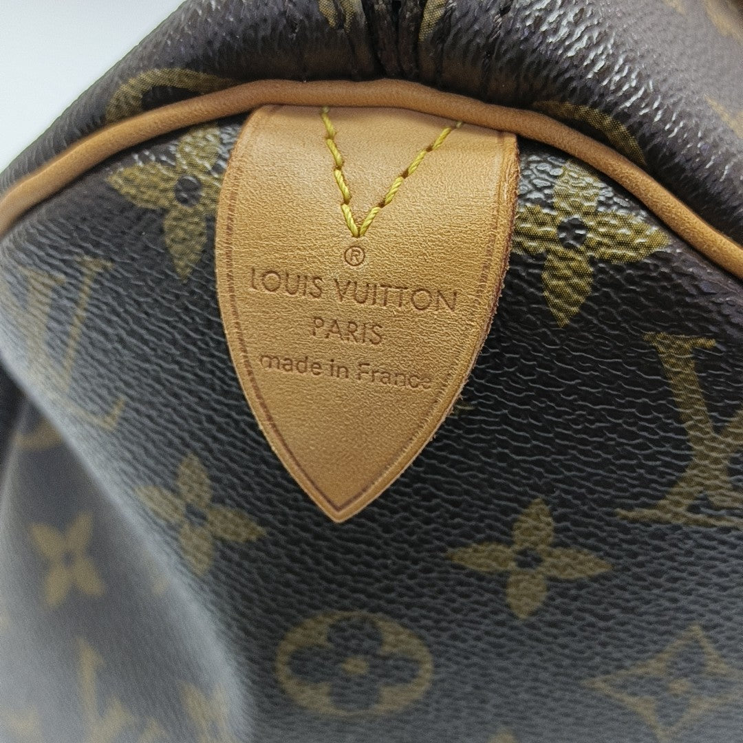 SPEEDY 30 Monogram Coated Canvas Brown