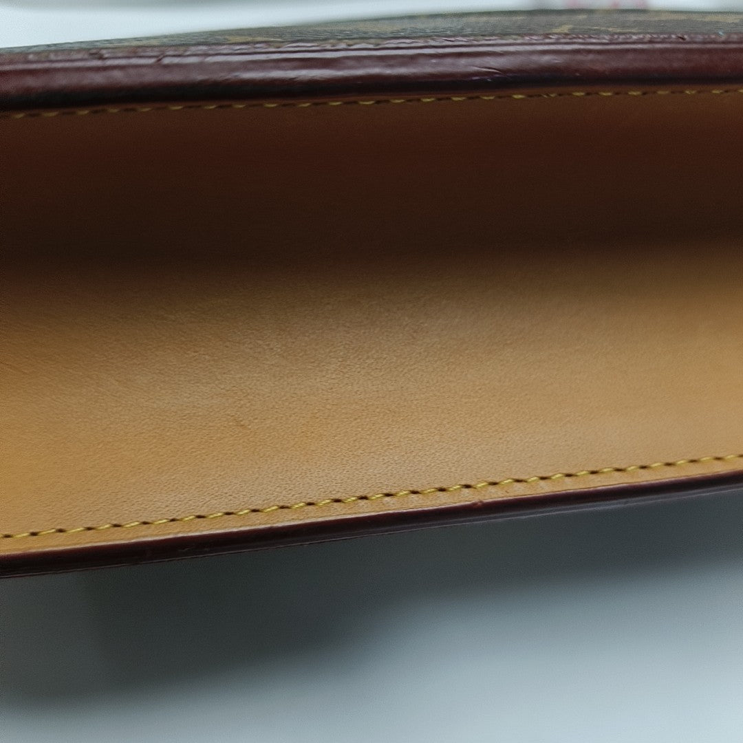 S LOCK Monogram Coated Canvas Brown