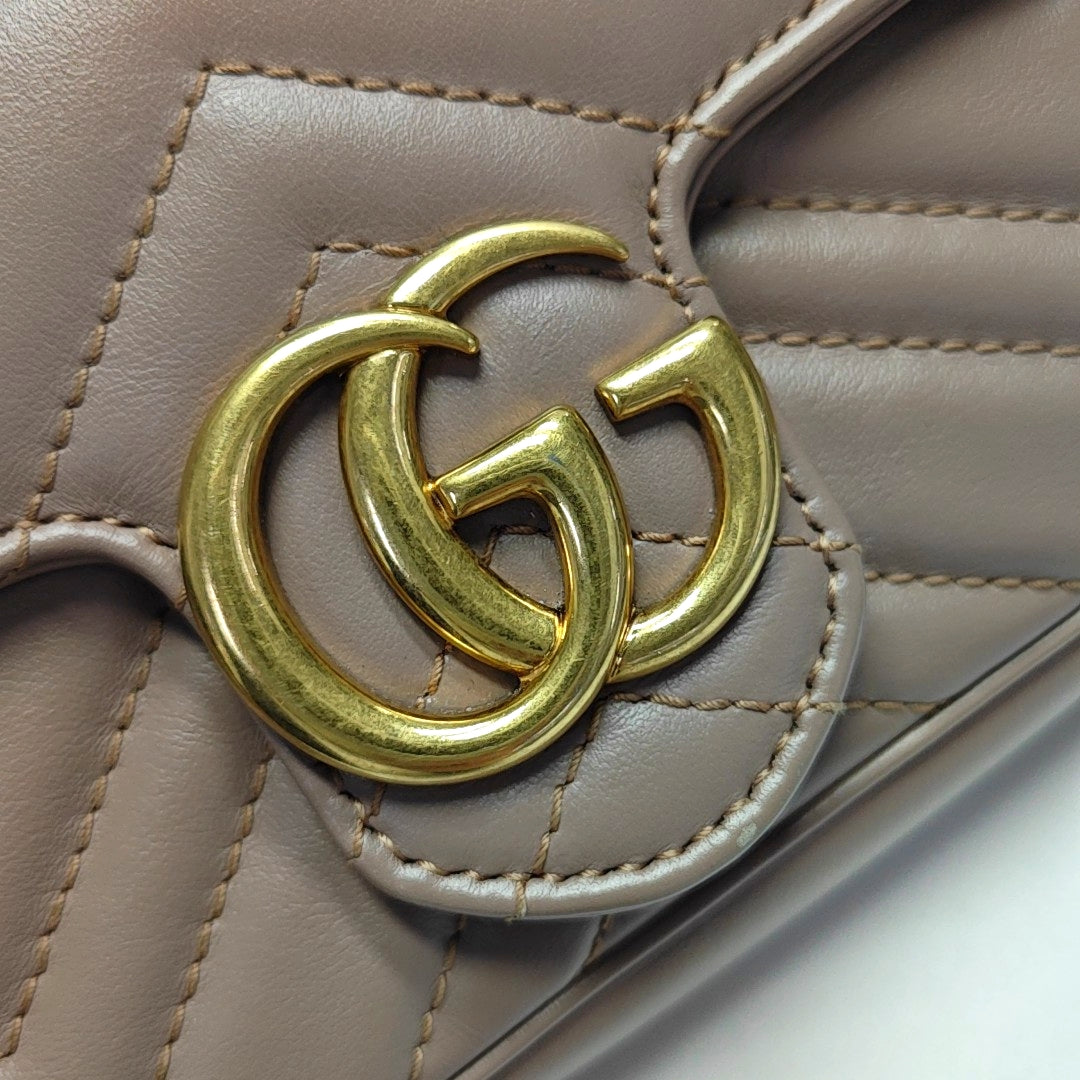 Authenticated pre-owned  GG Marmont Mini Quilted Calfskin Beige - Shoulder Bag at Looply