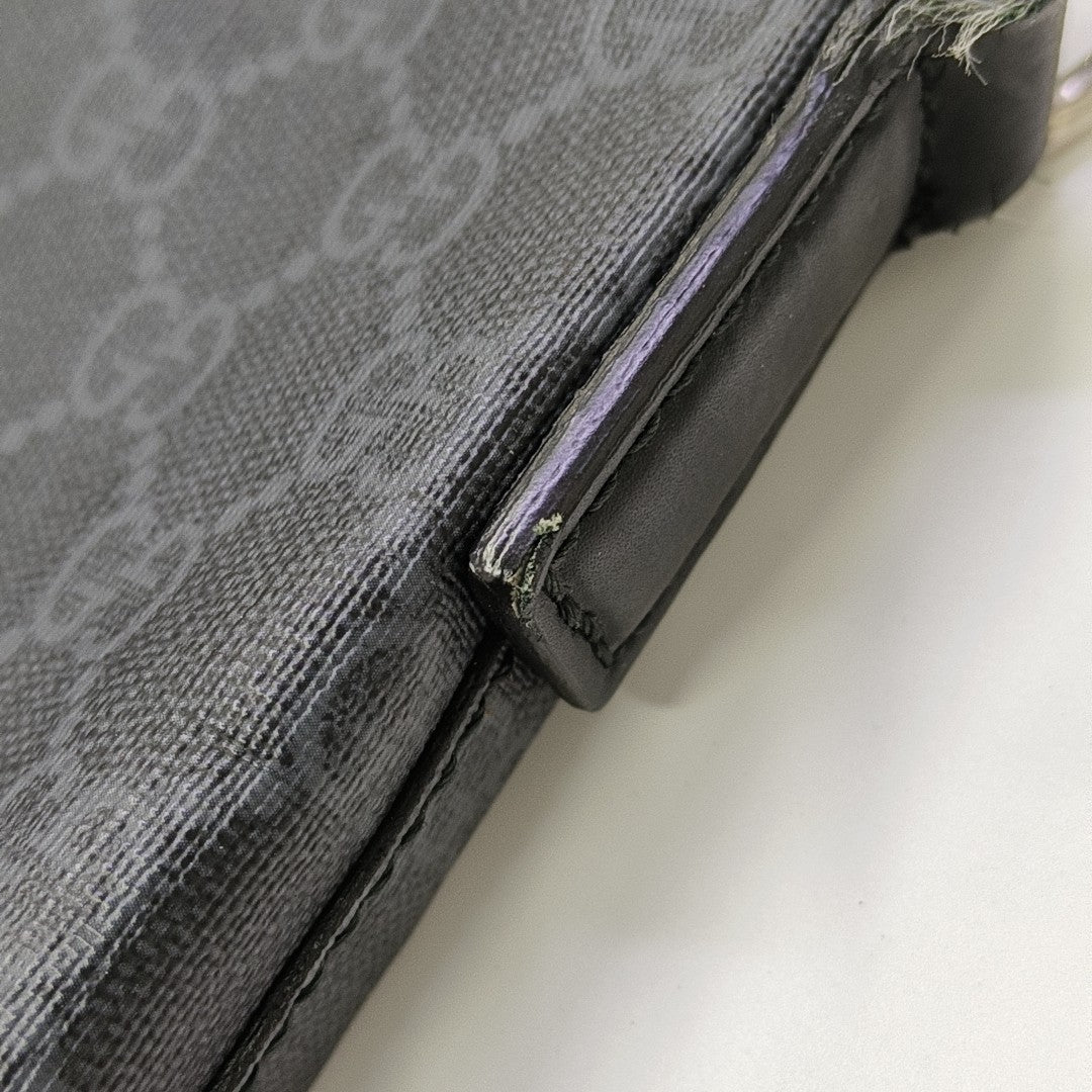 Rania Monogram Coated Canvas Black