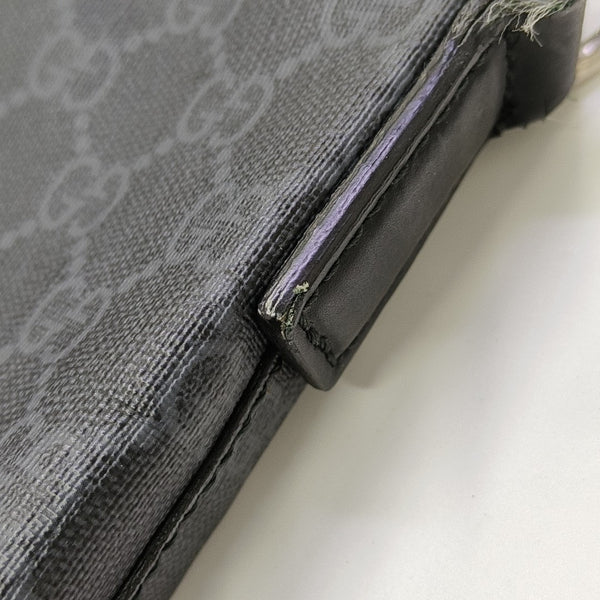 Rania Monogram Coated Canvas Black
