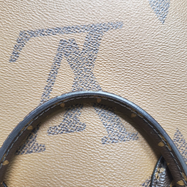 ONTHEGO MM Monogram Coated Canvas Brown