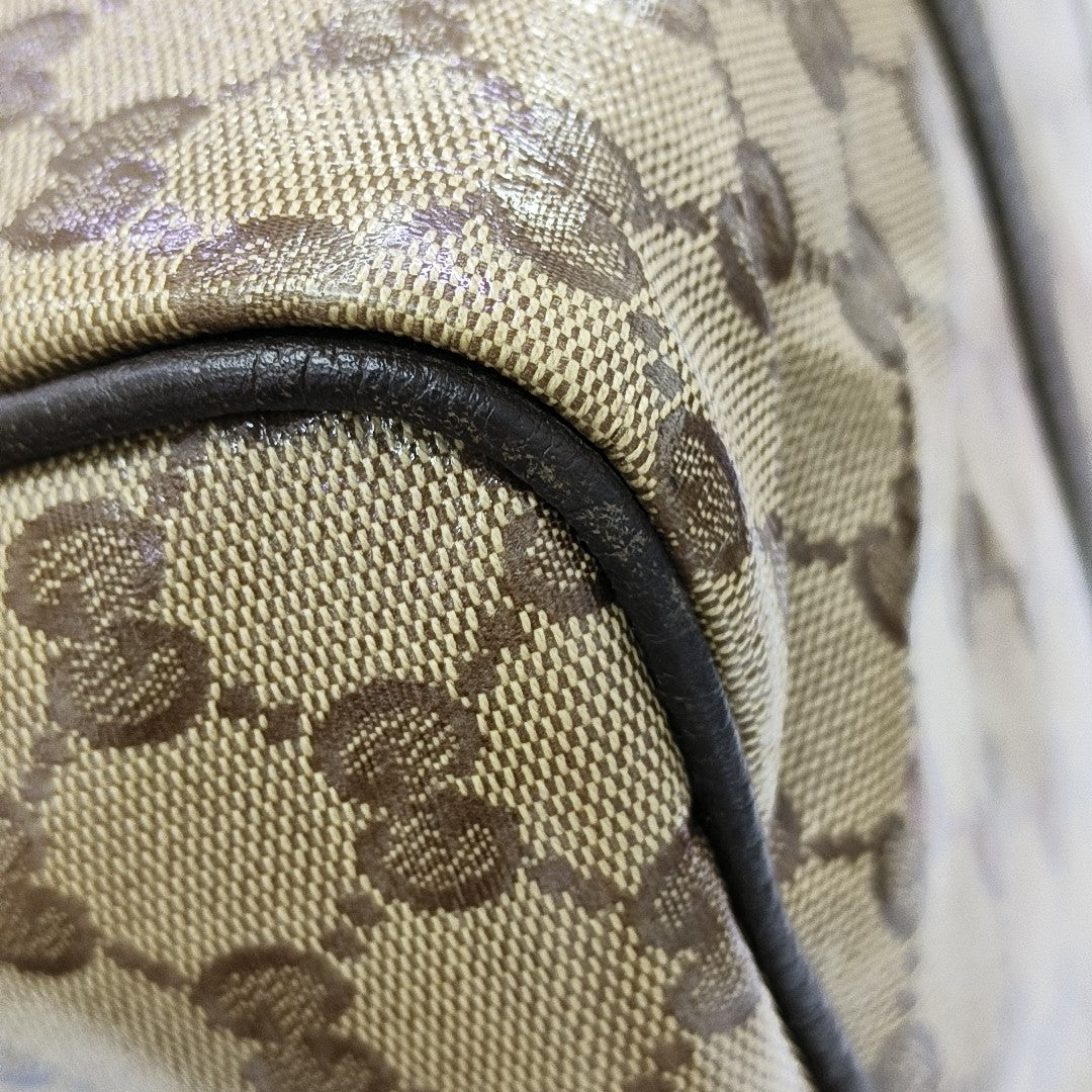Joy Medium Monogram Coated Canvas Brown