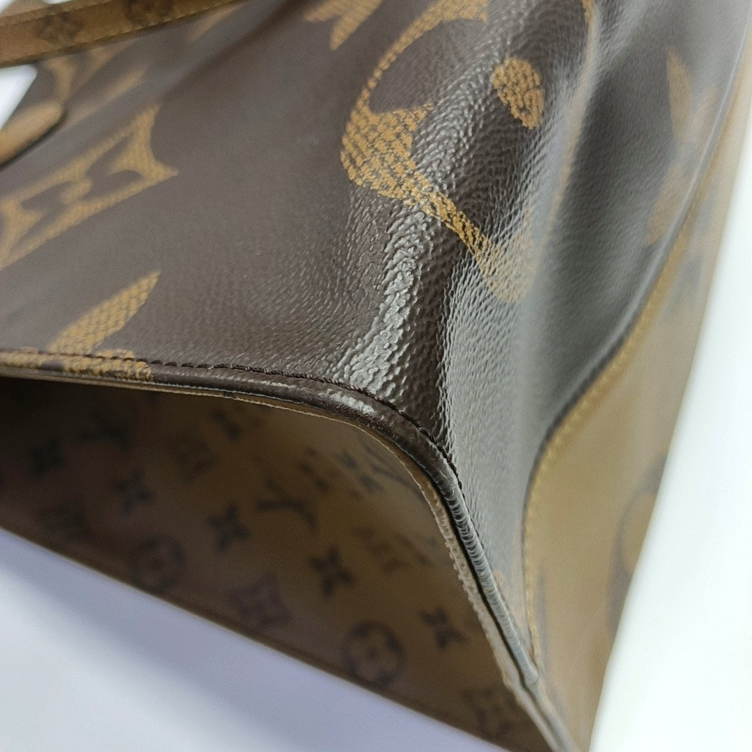 Authenticated pre-owned  ONTHEGO GM Monogram Coated Canvas Brown - Tote Bag at Looply