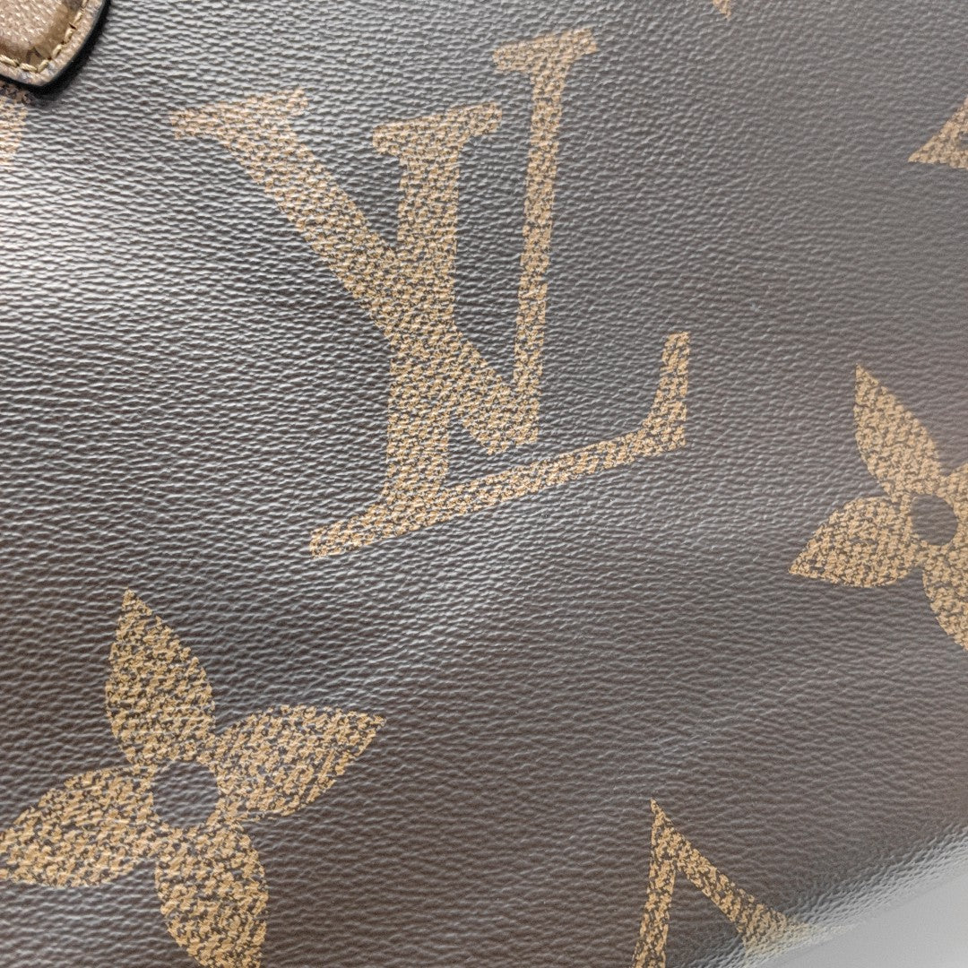 ONTHEGO MM Monogram Coated Canvas Brown