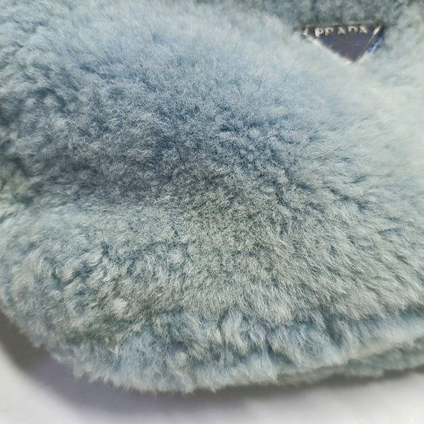 Authenticated pre-owned  Re-Edition2000 Mini Sheepskin Blue - Top Handle Bag at Looply