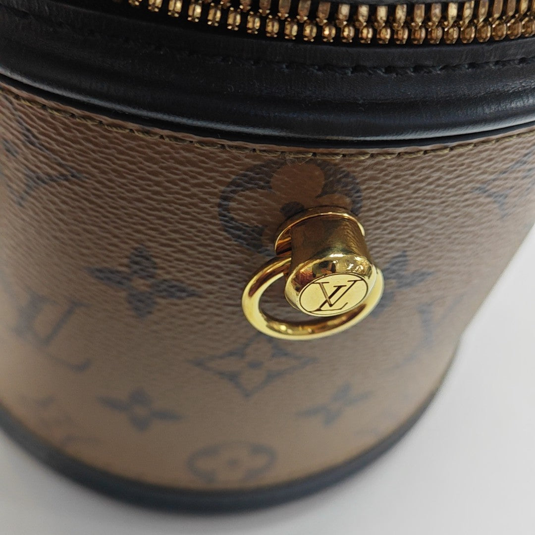 CANNES PM Monogram Coated Canvas Brown