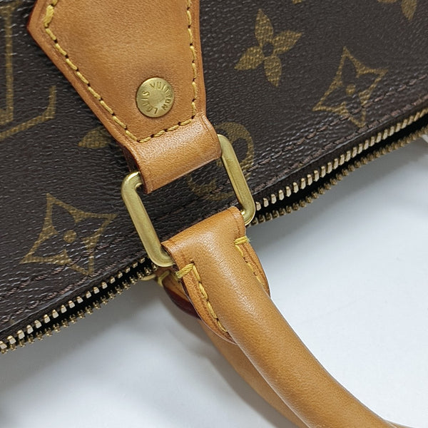 SPEEDY 25 Monogram Coated Canvas Brown