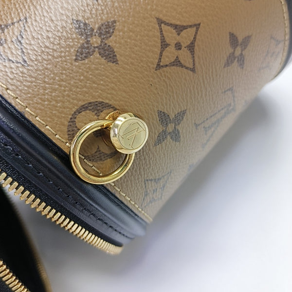 CANNES PM Monogram Coated Canvas Brown