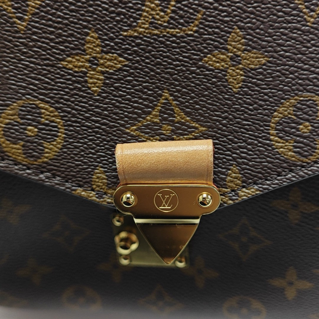 MÉTIS MM Monogram Coated Canvas Brown
