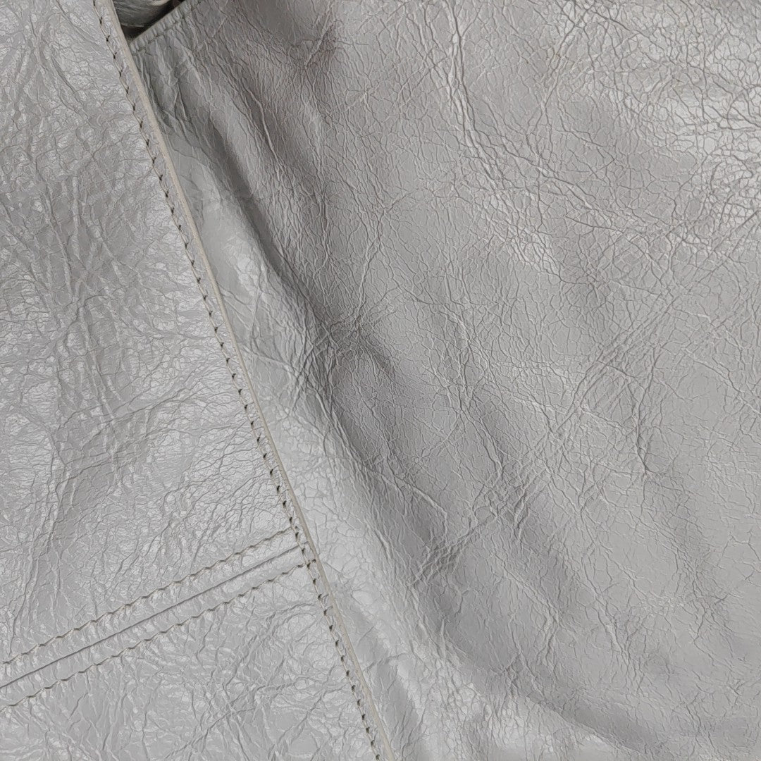Authenticated pre-owned  Le Cagole XS Lambskin White - Shoulder Bag at Looply