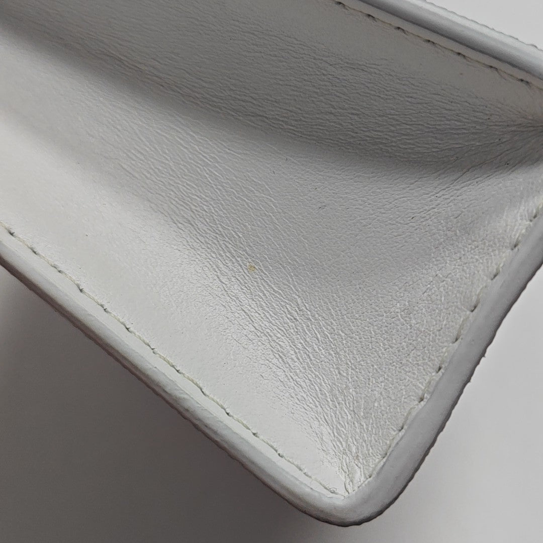 Pochette Voyag MM Monogram Coated Canvas White