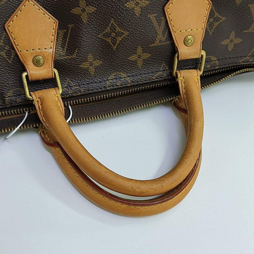 SPEEDY 35 Monogram Coated Canvas Brown