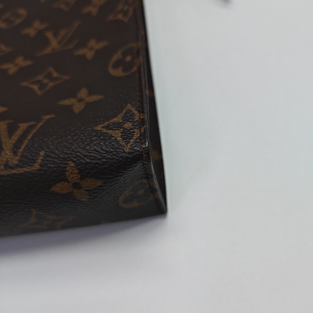 TOILET POCKET 26 Monogram Coated Canvas Brown