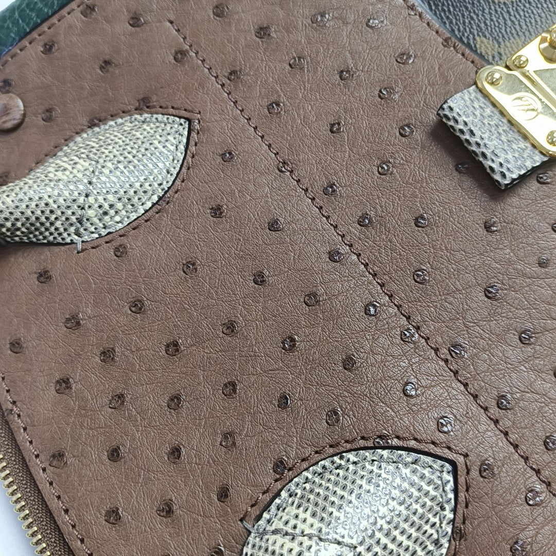 MAJESTUEUX Monogram Coated Canvas Brown