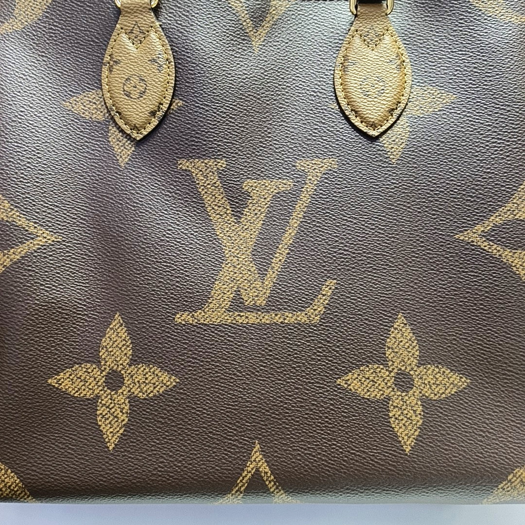 ONTHEGO MM Monogram Coated Canvas Brown