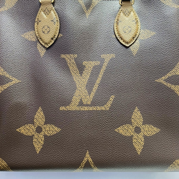 ONTHEGO MM Monogram Coated Canvas Brown