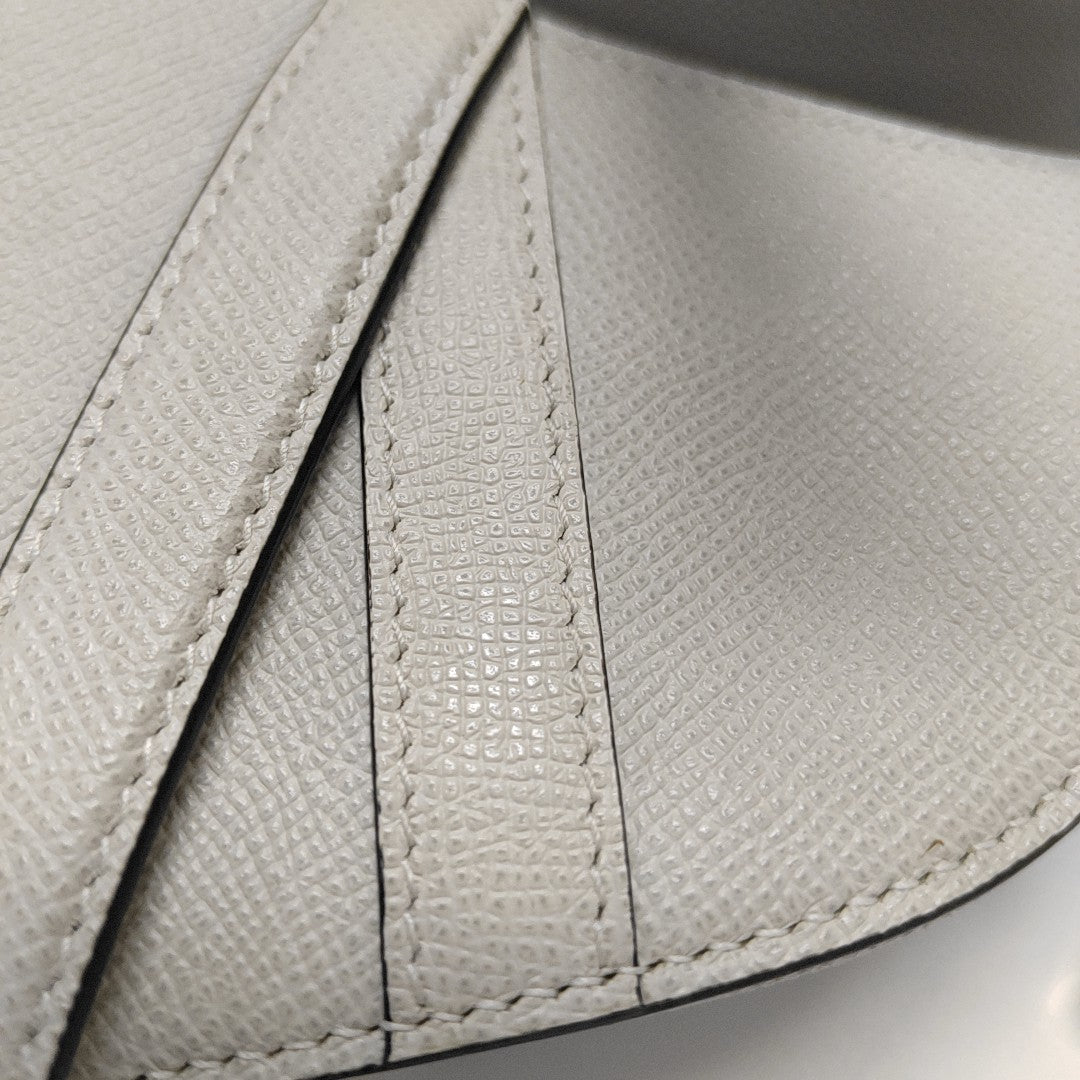 Authenticated pre-owned  Saddle Mini Calfskin White - Top Handle Bag at Looply