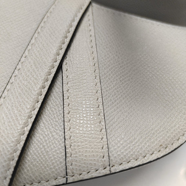 Authenticated pre-owned  Saddle Mini Calfskin White - Top Handle Bag at Looply