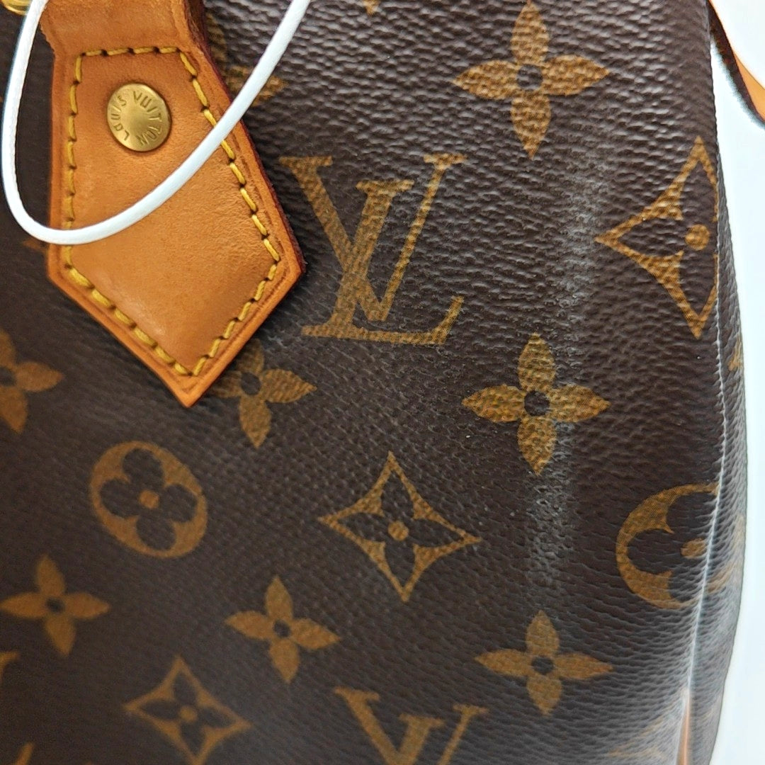 Authenticated pre-owned  SPEEDY 25 Monogram Coated Canvas Brown - Top Handle Bag at Looply
