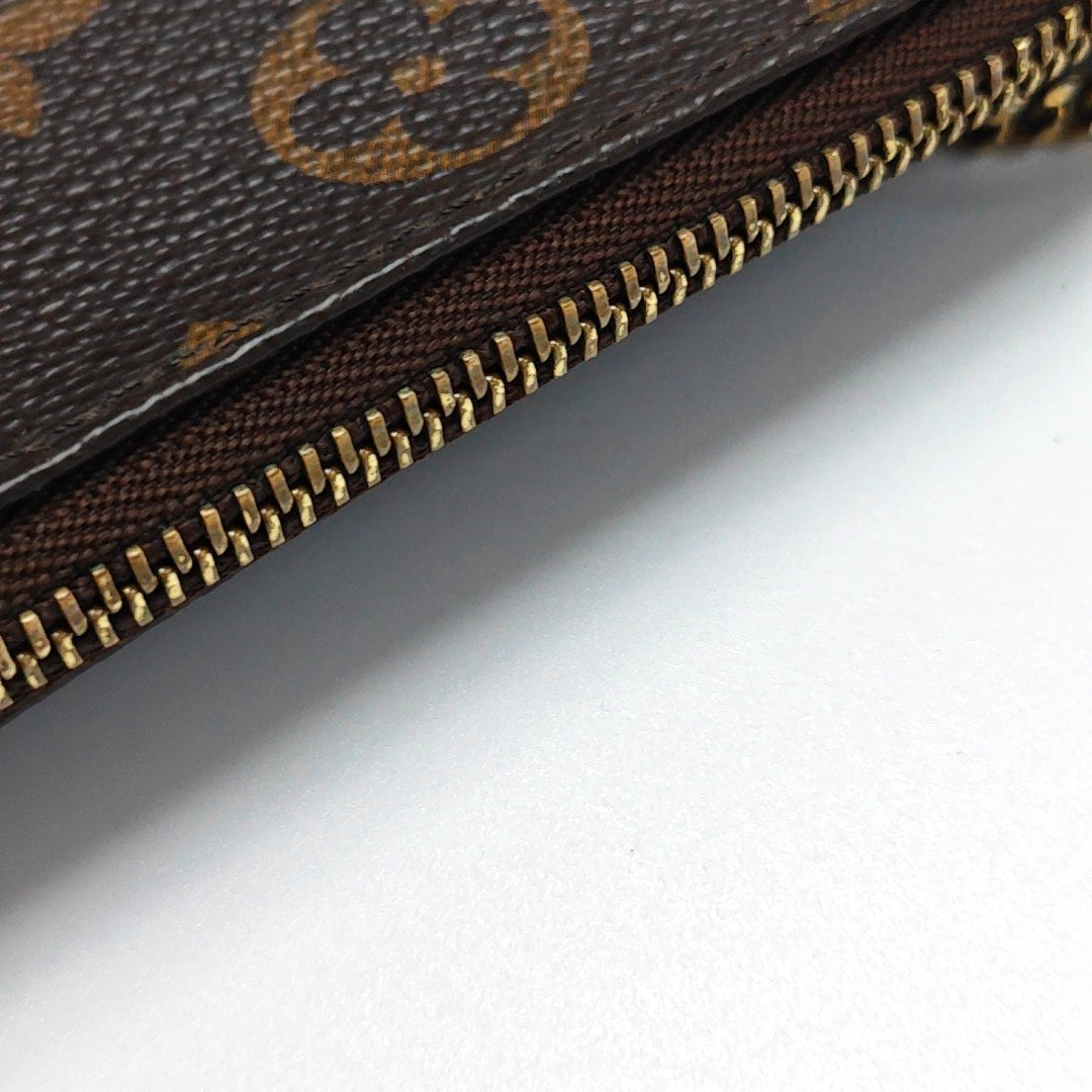 Authenticated pre-owned  ACCESSOIRES Mini Monogram Coated Canvas Brown - Top Handle Bag at Looply