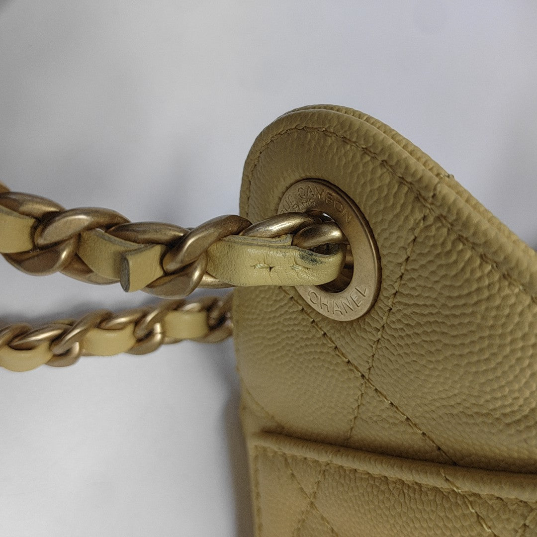 CHANEL 25 Quilted Grained Calfskin Yellow