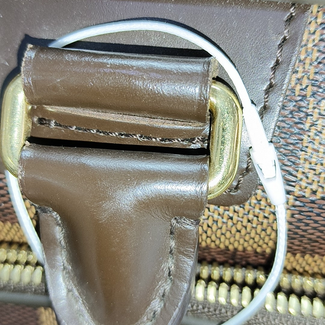 ICARE Damier Ebene Coated Canvas Brown