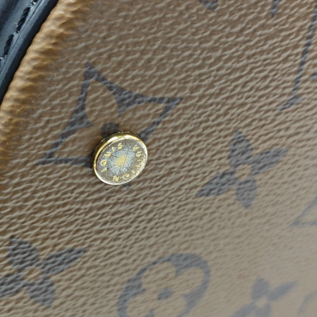CANNES PM Monogram Coated Canvas Brown