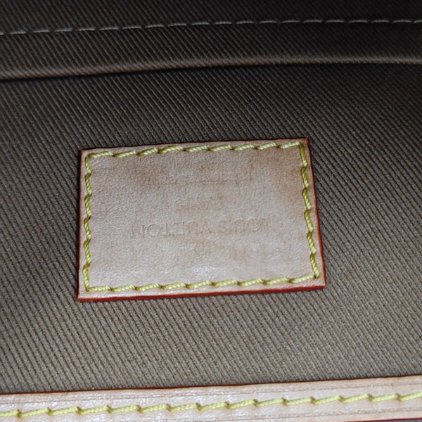 EXCURSION PM Monogram Coated Canvas Brown