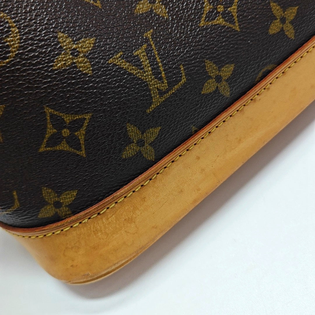 ALMA PM Monogram Coated Canvas Brown