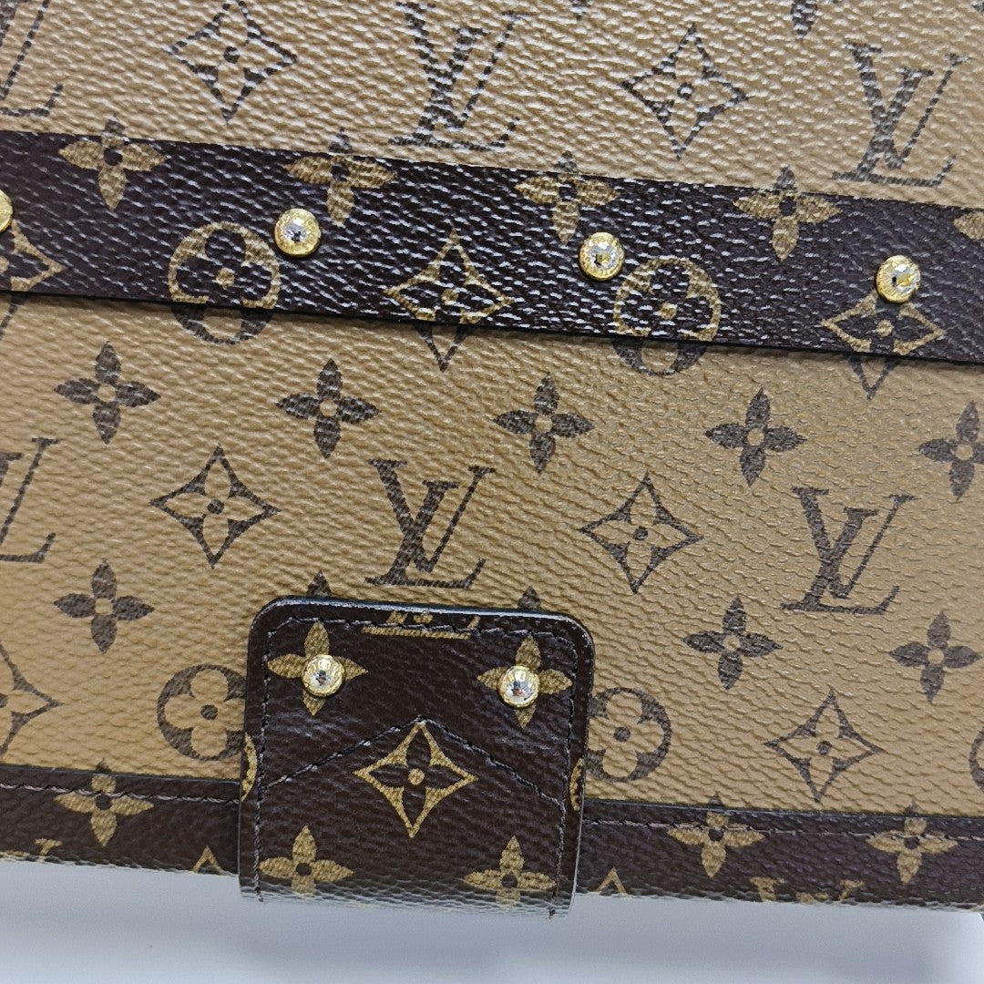 PETITE MALLE Monogram Coated Canvas Brown