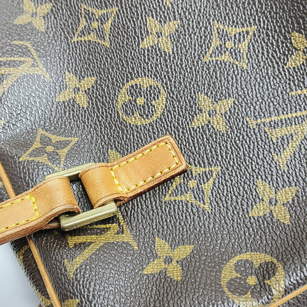 CITE MM Monogram Coated Canvas Brown