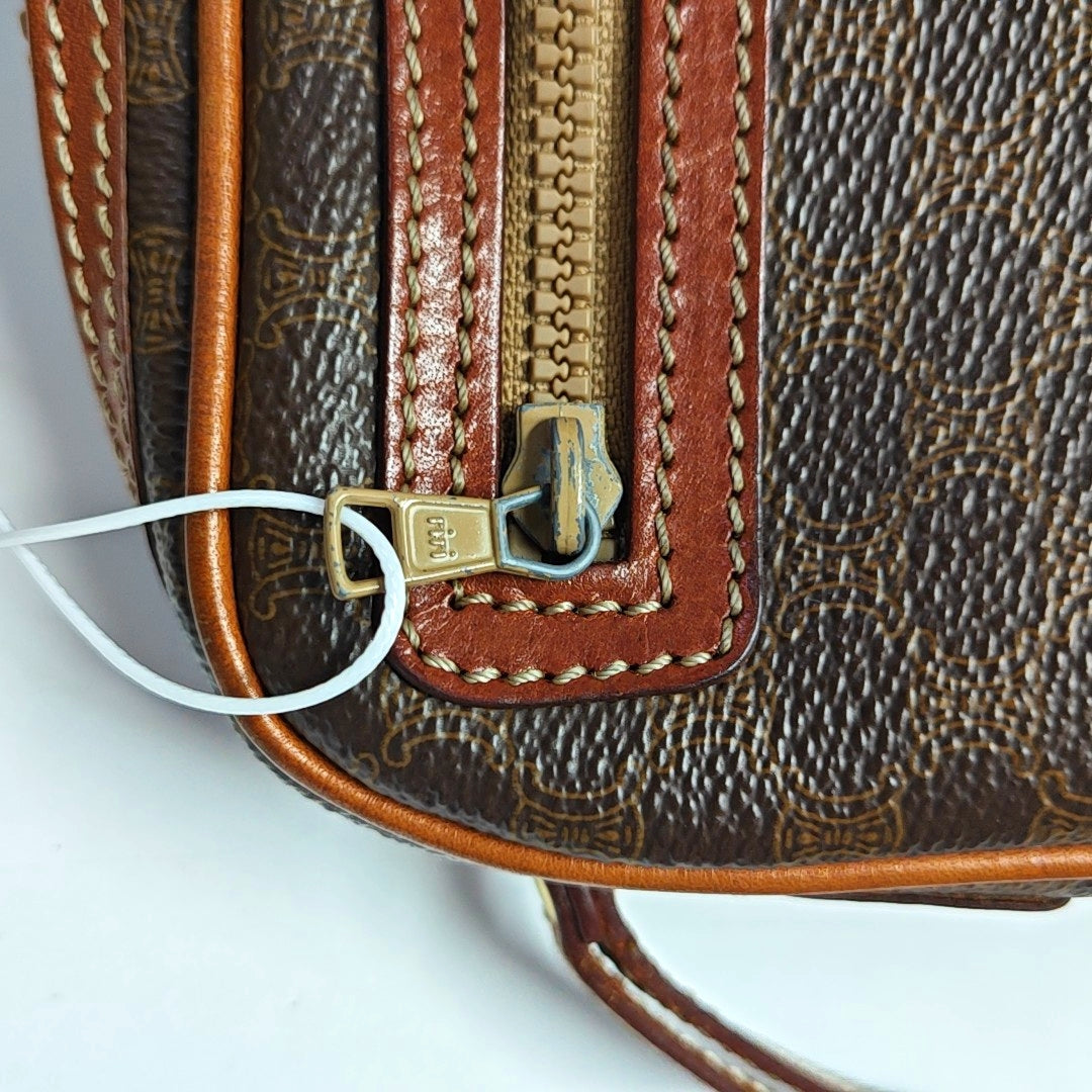 Authenticated pre-owned  MACADAM CLUTCHES Coated Canvas Brown - Clutch at Looply