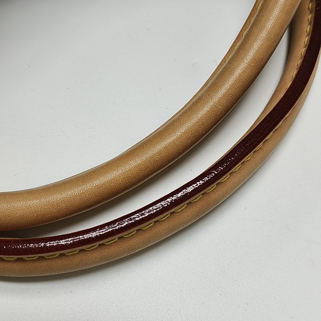 MONTAIGNE GM Monogram Coated Canvas Brown