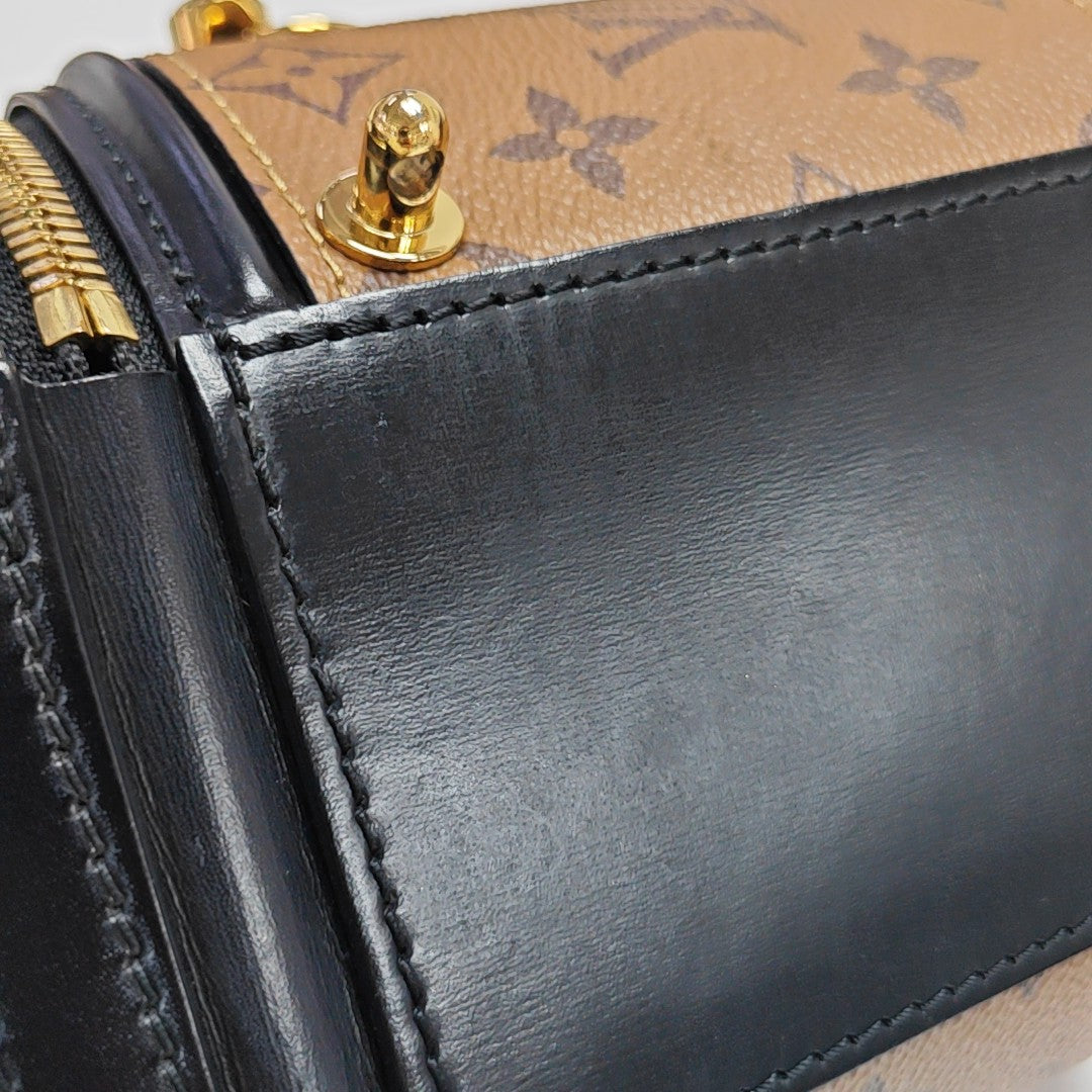 CANNES PM Monogram Coated Canvas Brown