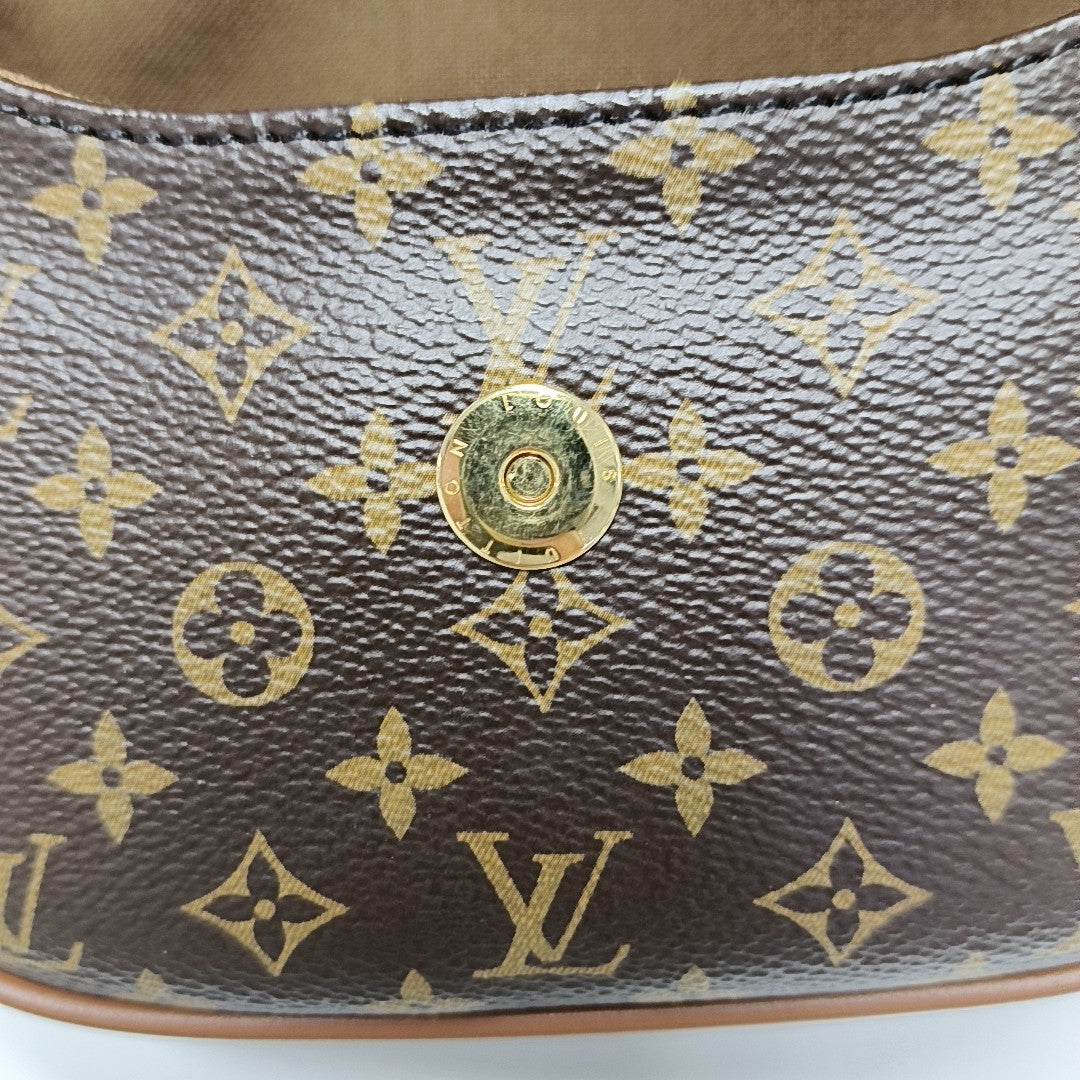 SAUMUR Monogram Coated Canvas Brown