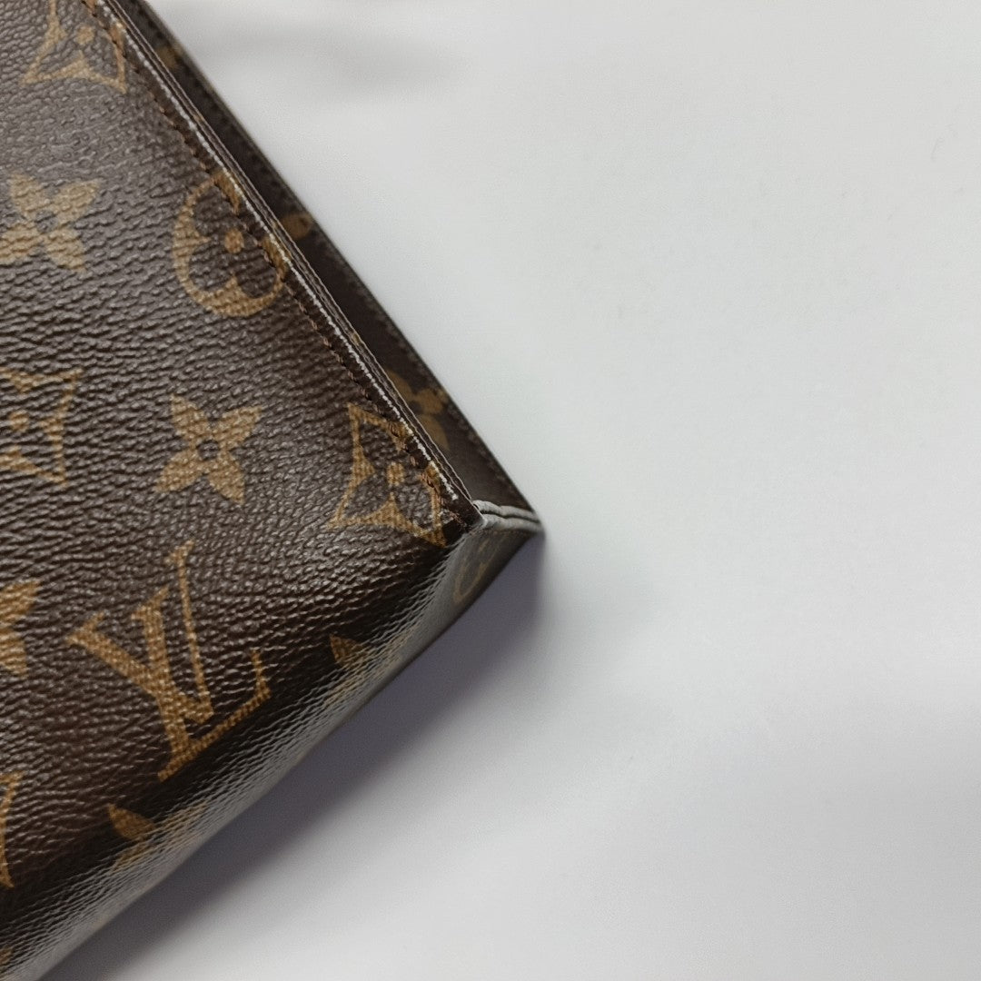 TOILET POCKET 26 Monogram Coated Canvas Brown