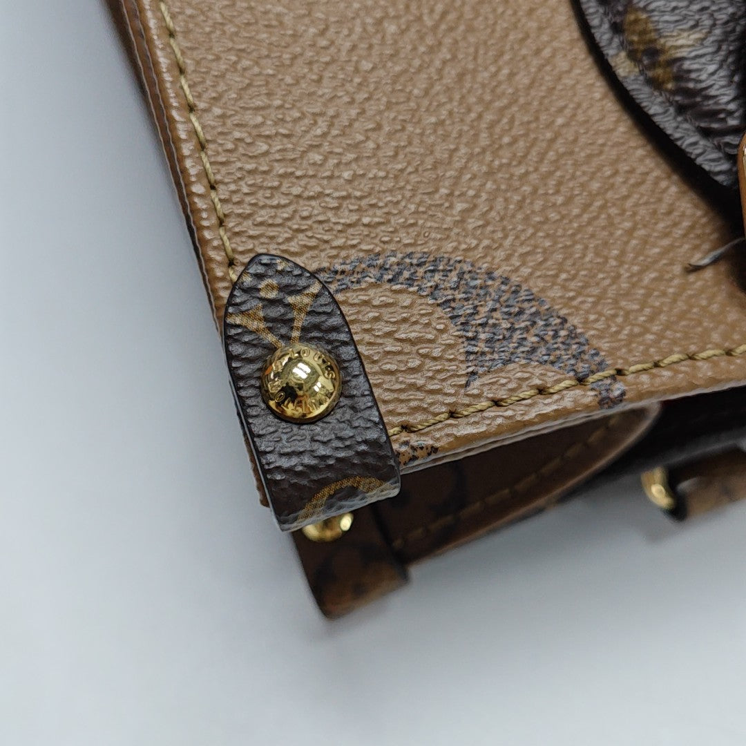 ONTHEGO PM Monogram Coated Canvas Brown