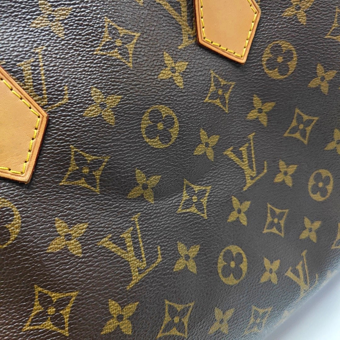 Authenticated pre-owned  SPEEDY 35 Monogram Coated Canvas Brown - Top Handle Bag at Looply