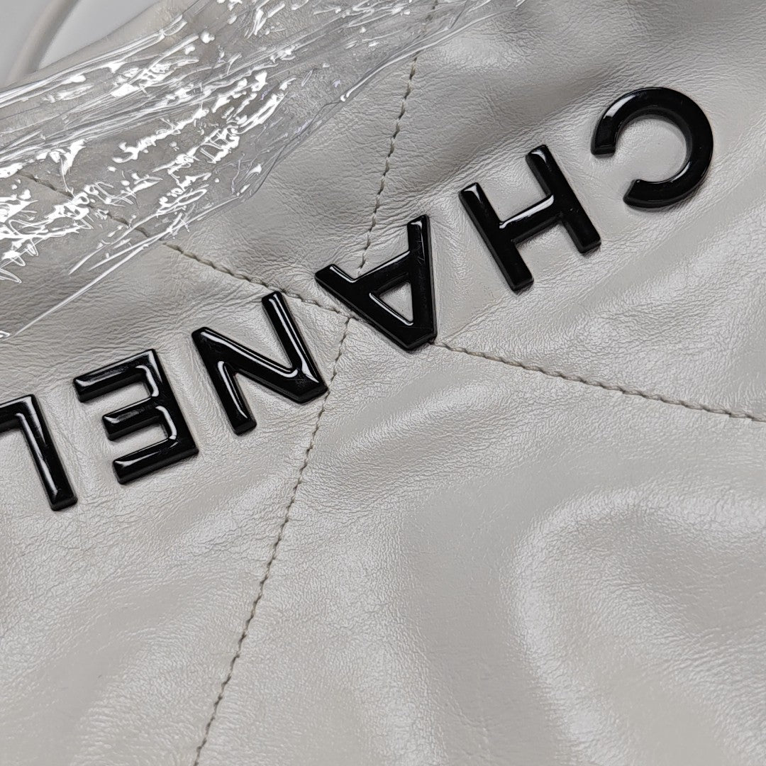 Authenticated pre-owned  CHANEL 22 Mini Quilted Calfskin White - Tote Bag at Looply