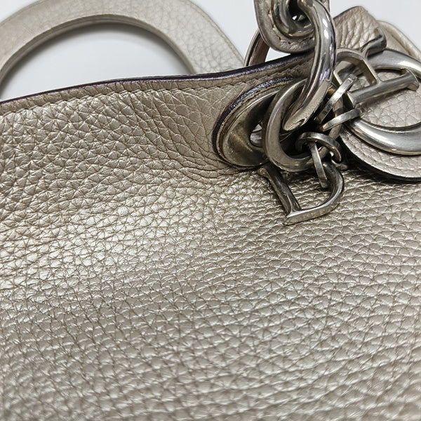 Authenticated pre-owned  Diorissimo Calfskin Beige - Tote Bag at Looply