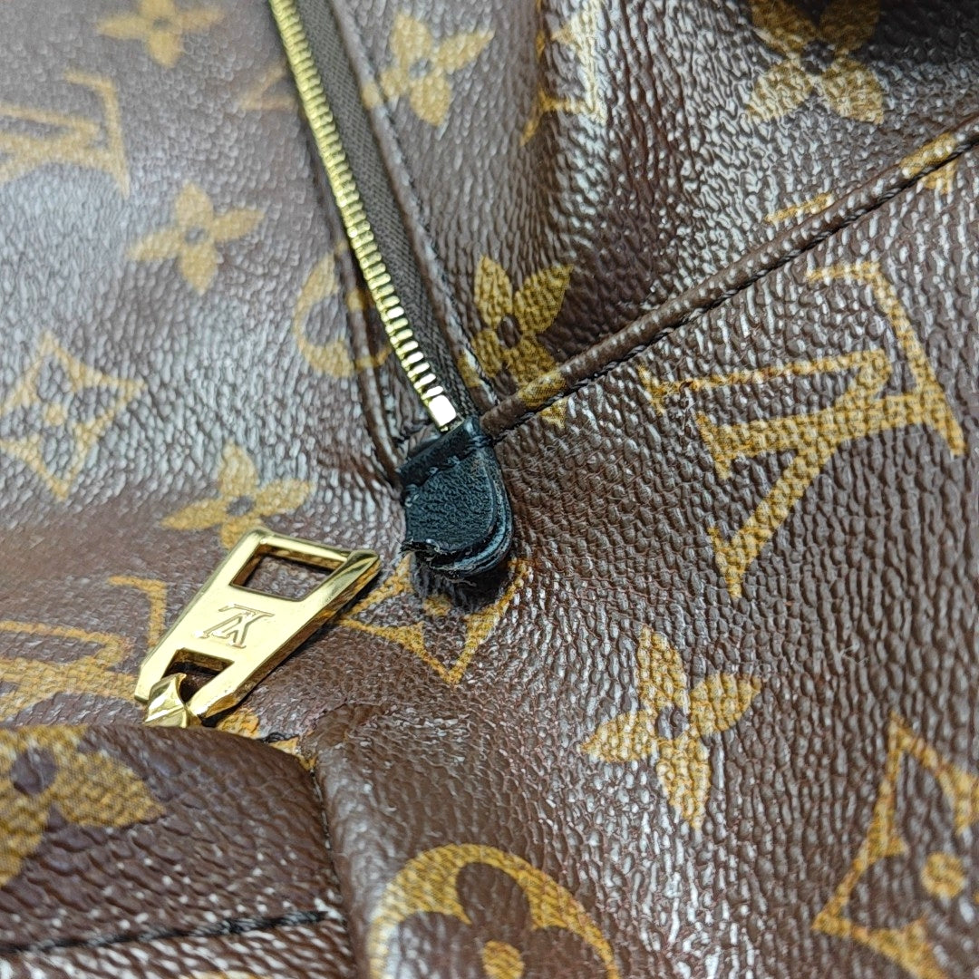 Authenticated pre-owned  PALM SPRINGS MM Monogram Coated Canvas Brown - Backpack at Looply