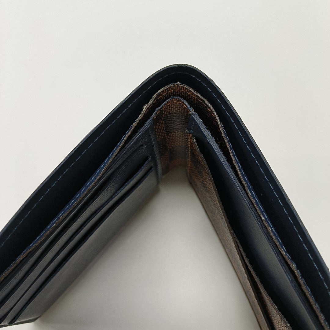 Damier Ebene Coated Canvas Wallet Brown