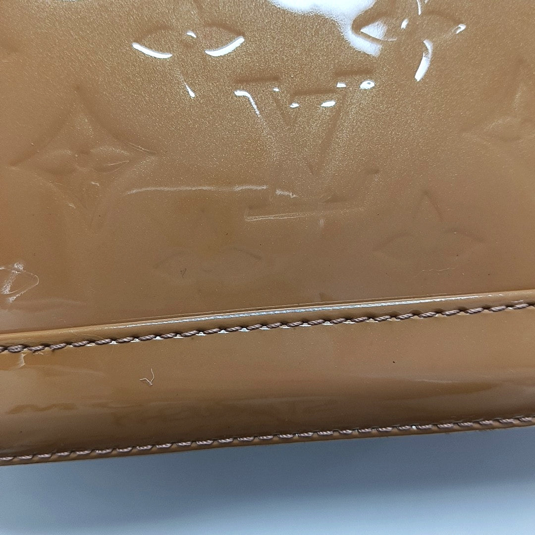 Authenticated pre-owned  ALMA Monogram Patent Leather Yellow - Shoulder Bag at Looply