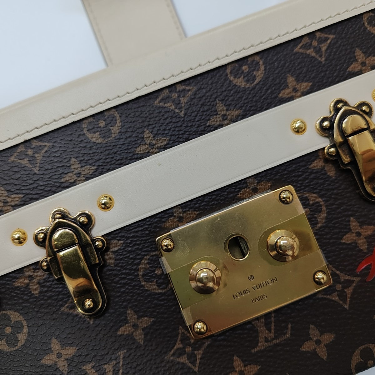 PETITE MALLE Monogram Coated Canvas Brown