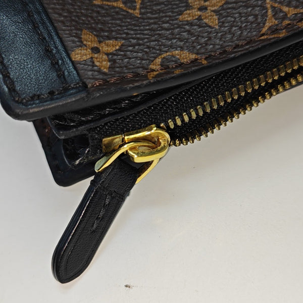 TRUNK Monogram Coated Canvas Brown