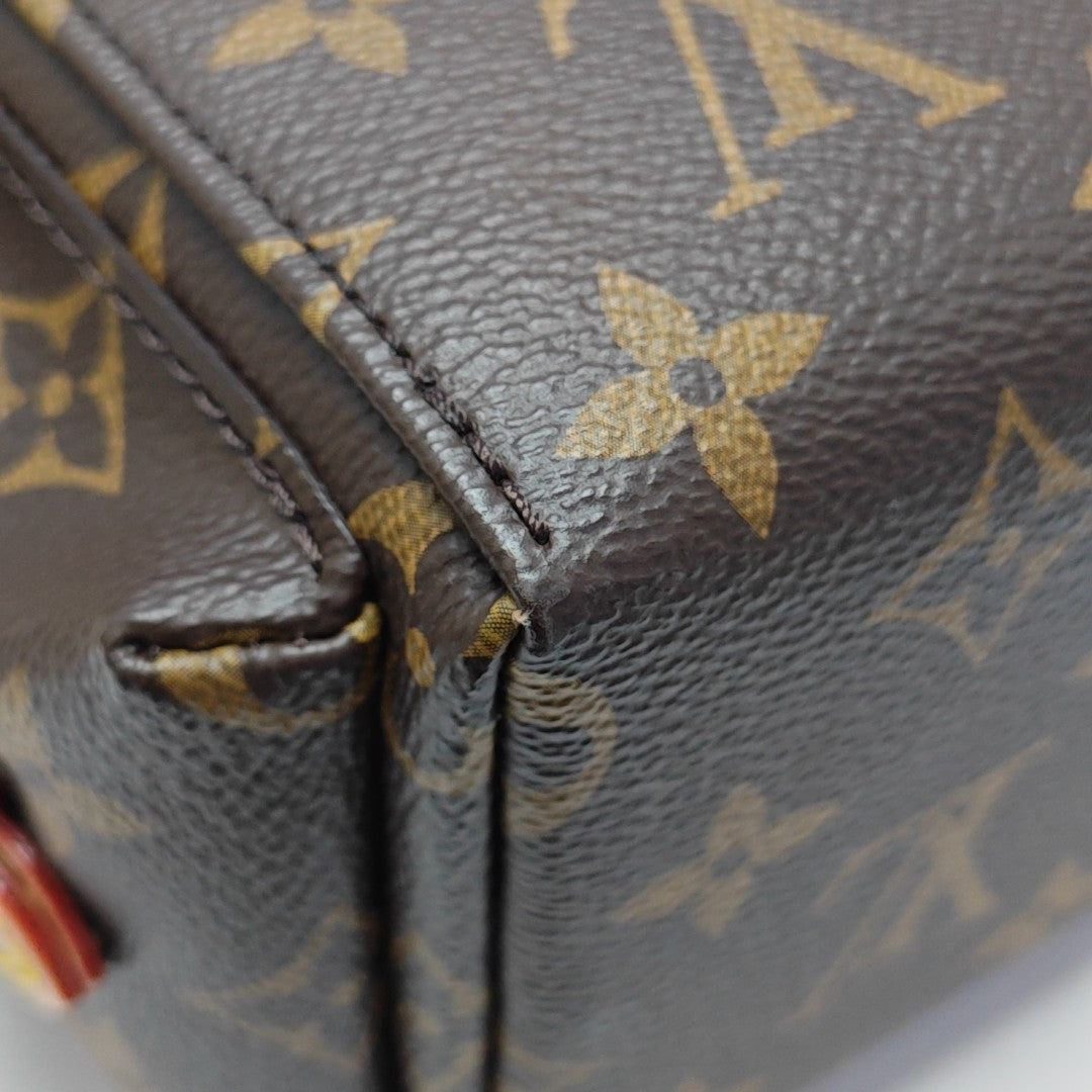 ODYSSEE Monogram Coated Canvas Brown