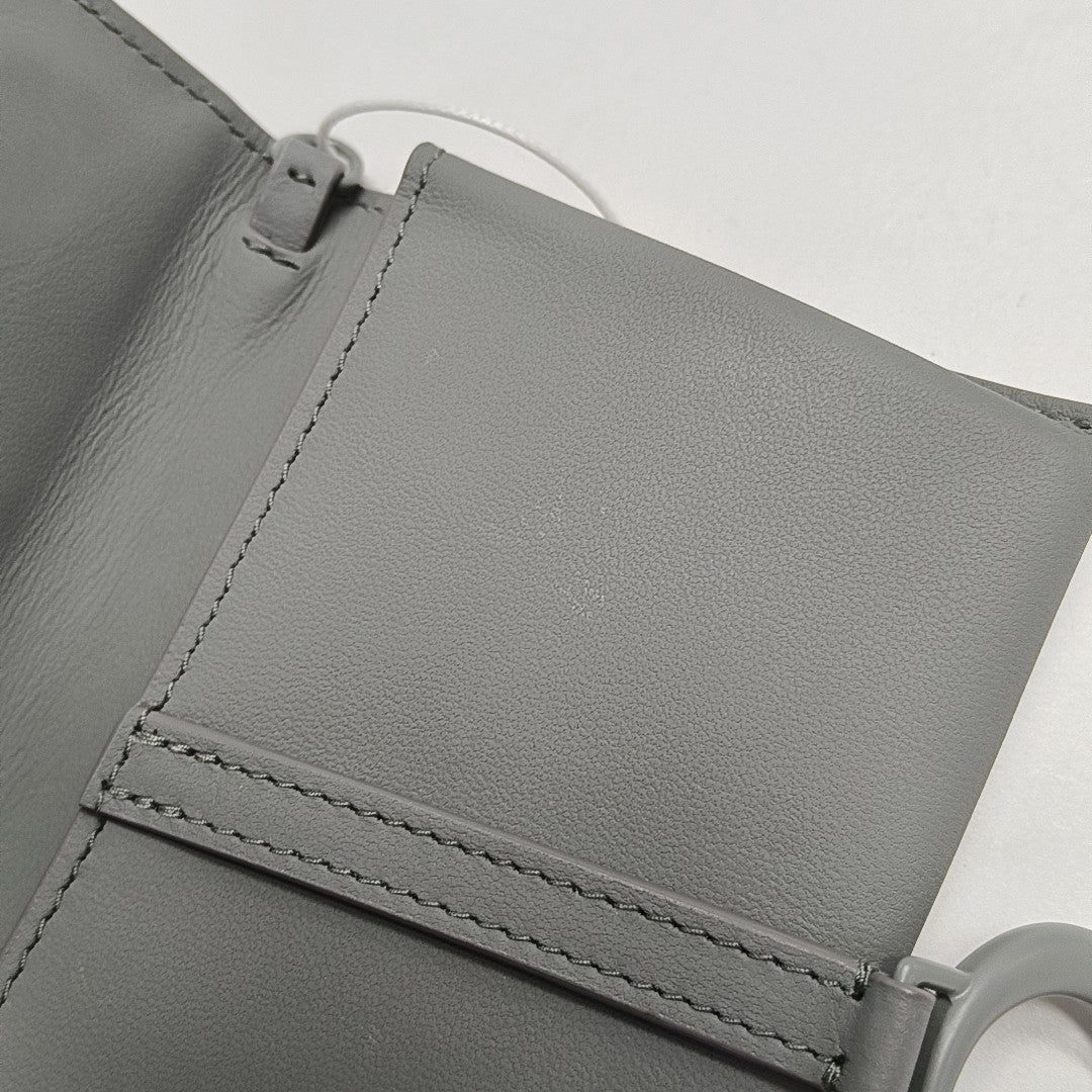 Authenticated pre-owned  Saddle Calfskin Grey - Shoulder Bag at Looply