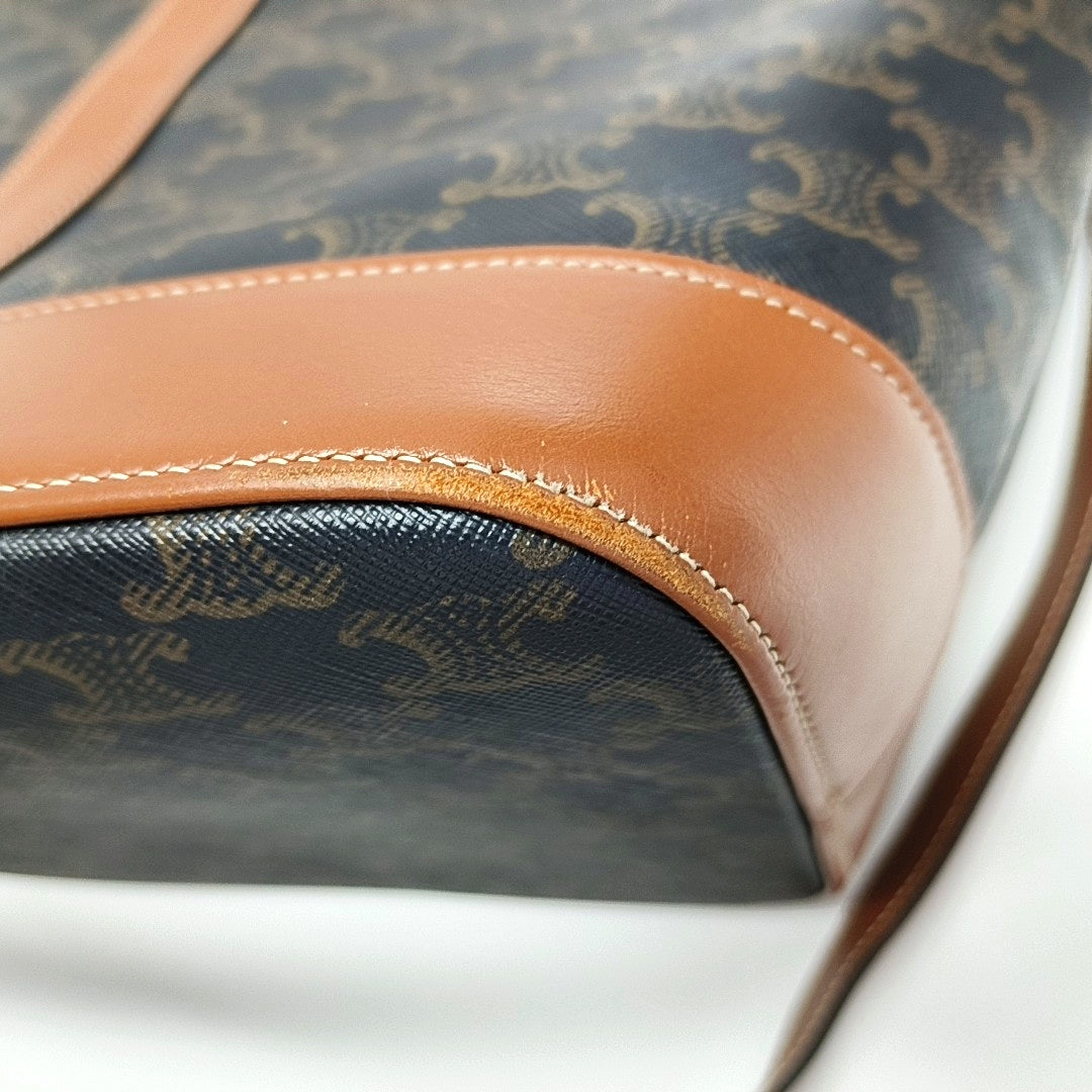 Authenticated pre-owned  TRIOMPHE CANVAS Medium Coated Canvas Brown - Bucket Bag at Looply