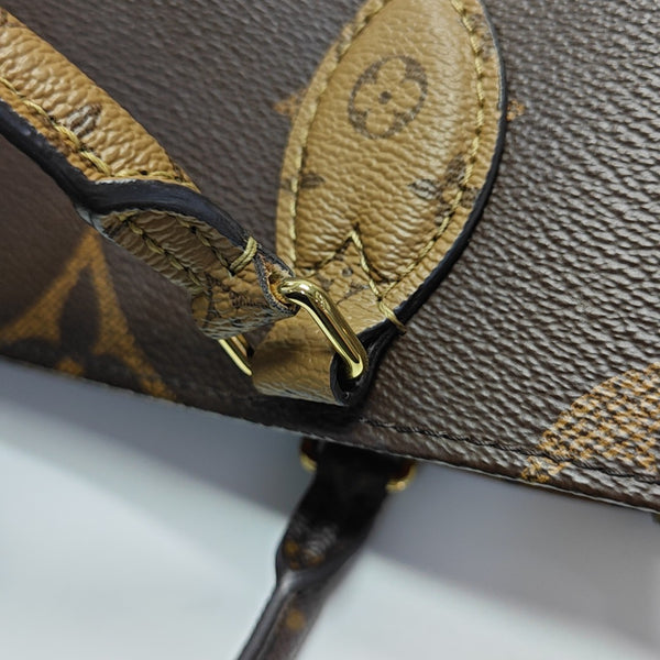 ONTHEGO PM Monogram Coated Canvas Brown